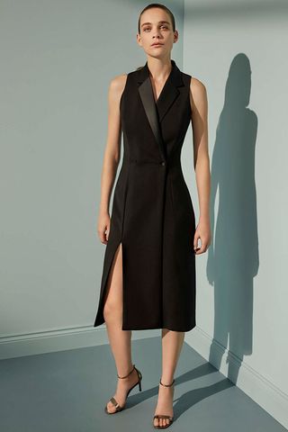 Model wearing black dress