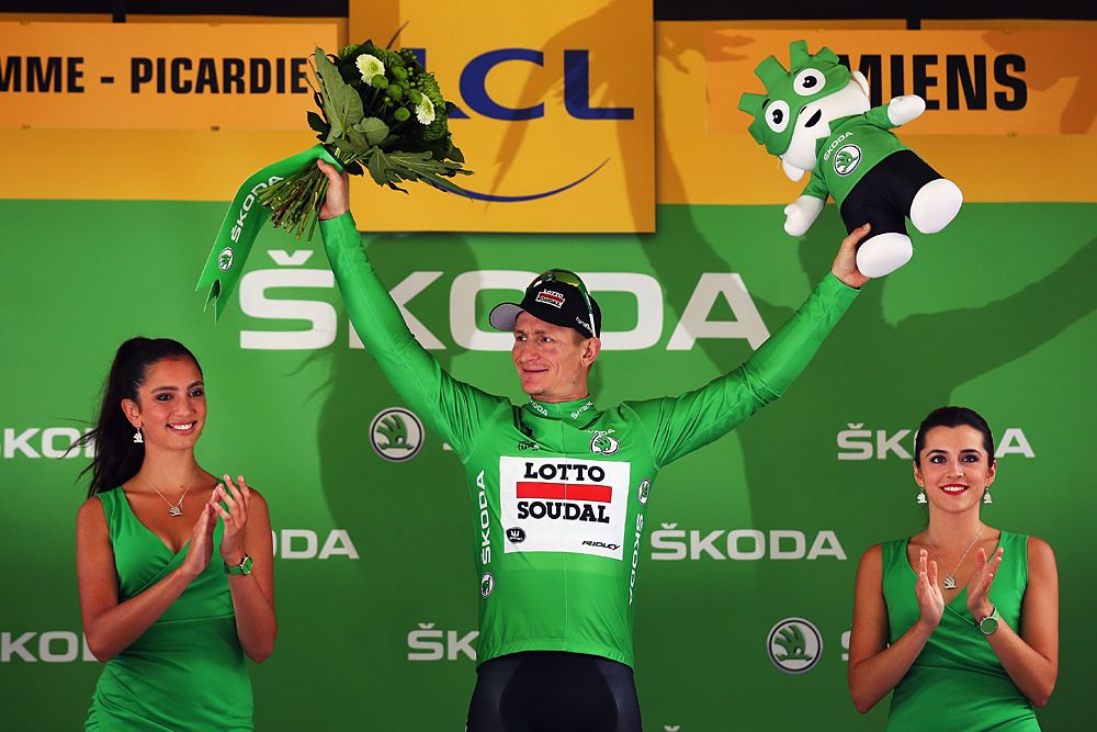 Andr&eacute; Greipel (Lotto Soudal) on the podium in the green jersey