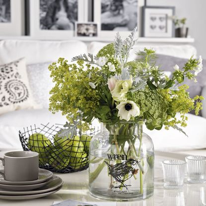 flowers in glass vase on table