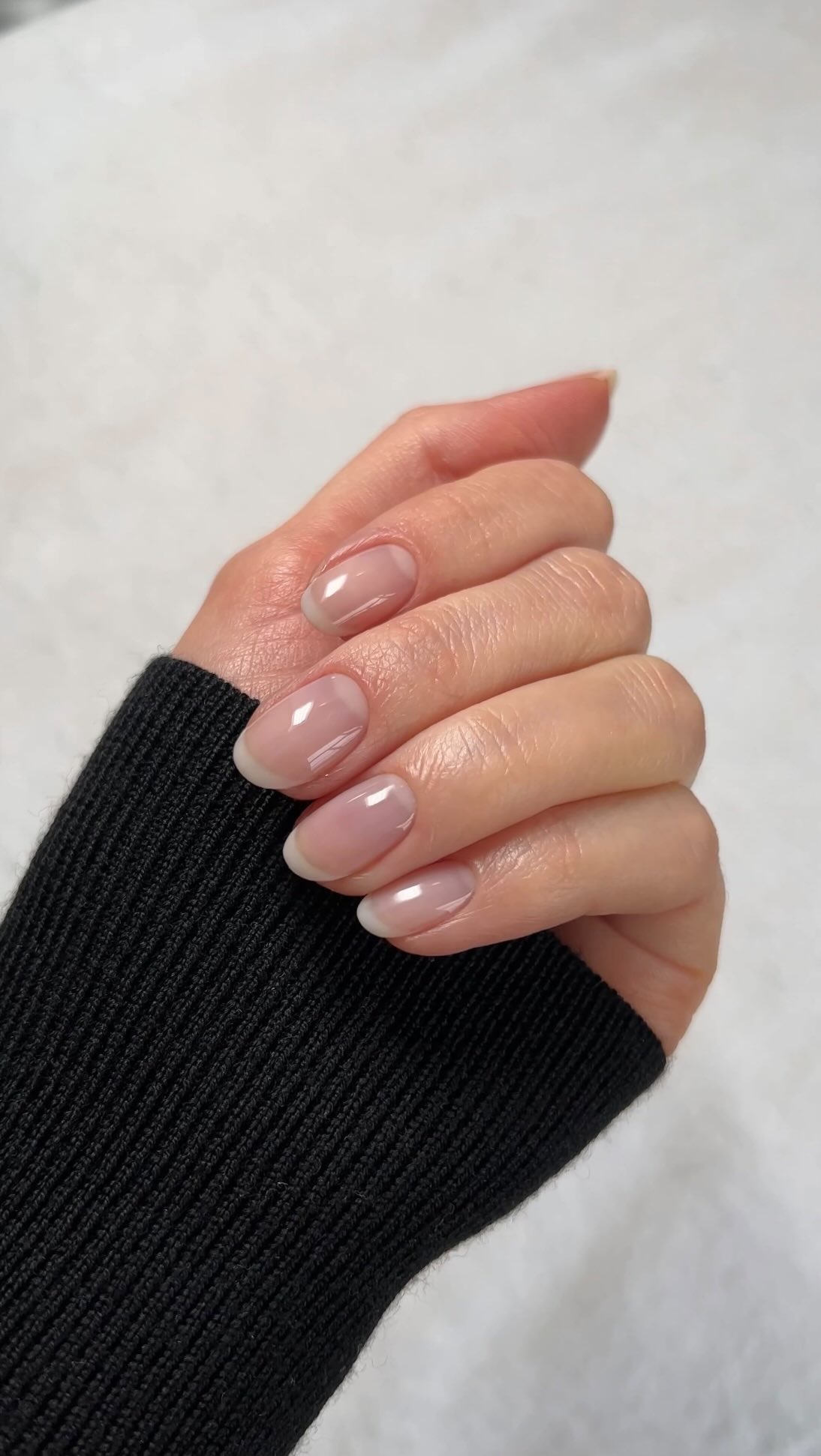 Rounded nails with a soft French manicure