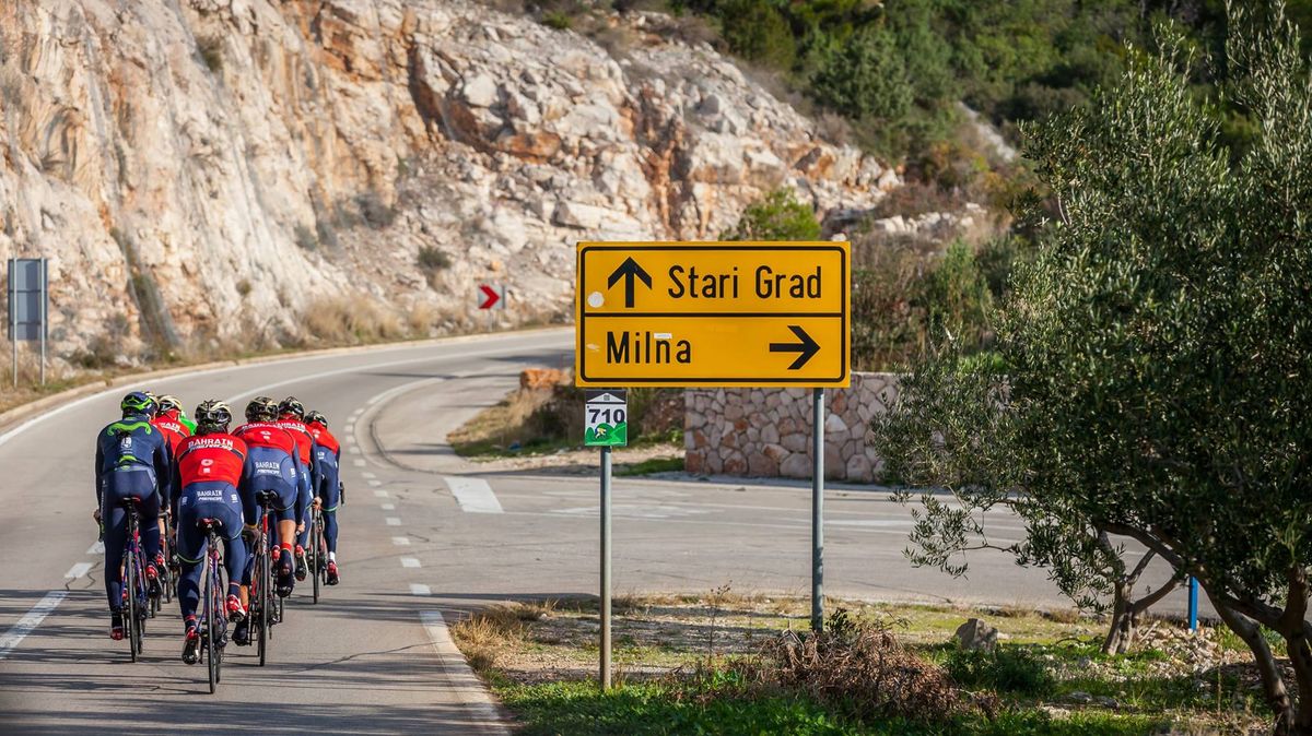 The riders take the road to Stari Grad over Milna..