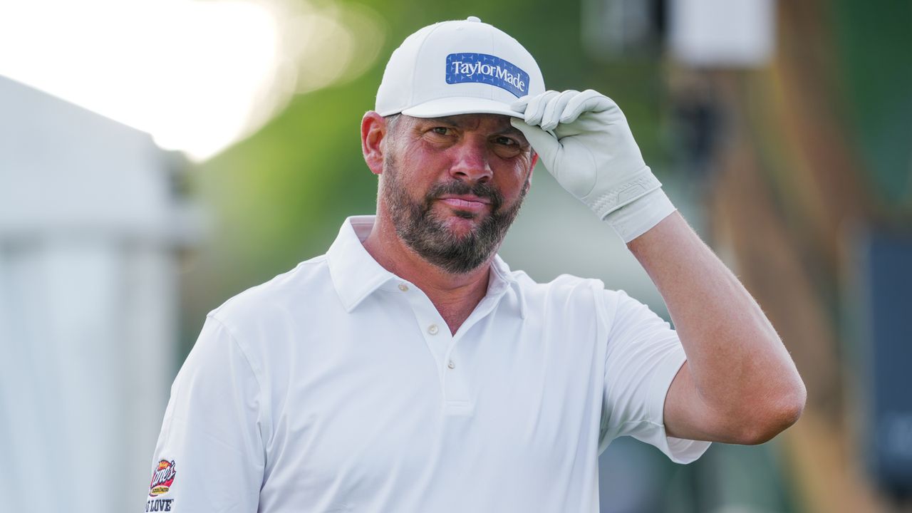 Michael Block tips his cap before teeing off at the Charles Scwab Challenge