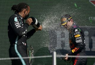 Verstappen, right, extended his drivers' championship lead over Lewis Hamilton (
