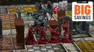 The heroes of the HeroQuest board game face off against an evil knight on a board filled with plastic terrain