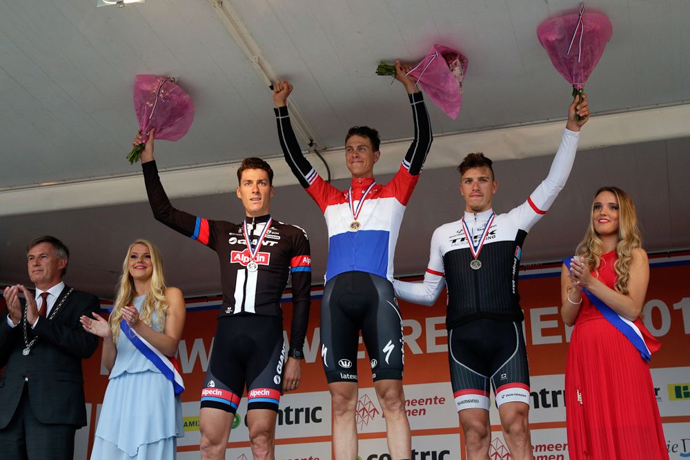 Niki Terpstra on the podium with Ramon Sinkledam and Danny Van Poppel.