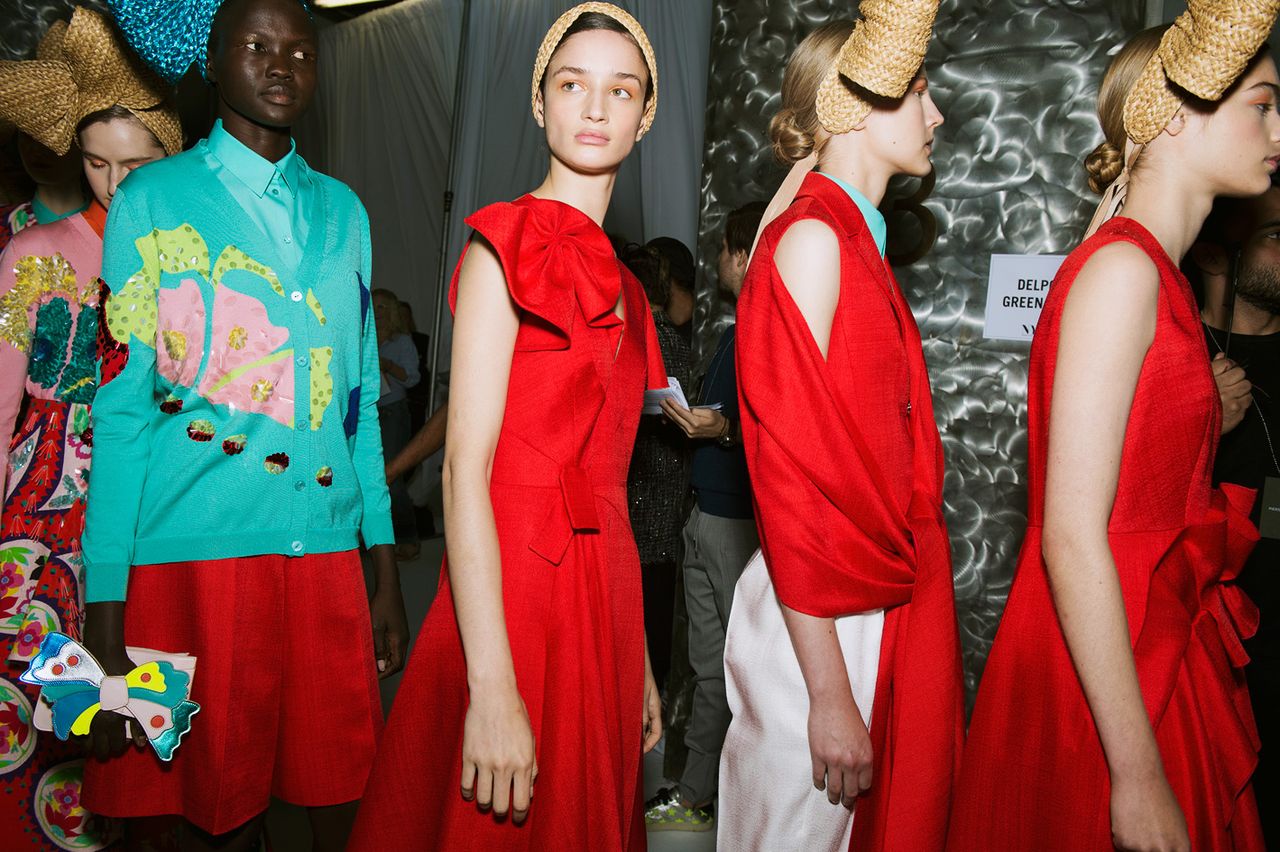 Models wearing red dress