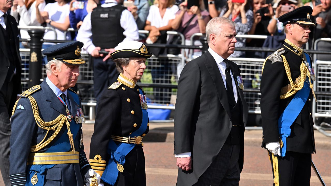 Queen procession lying-in-state - The queens children walking in procession behind the queens coffin