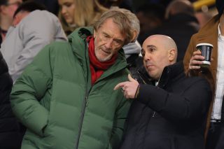 Omar Berrada (R) speaks to Sir Jim Ratcliffe