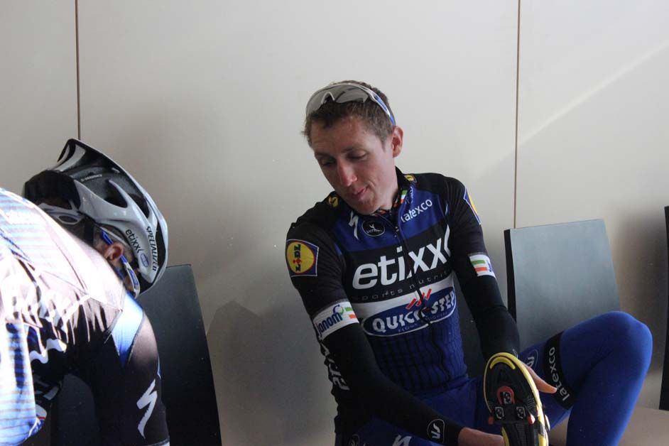 Dan Martin puts on his shoes before the ride