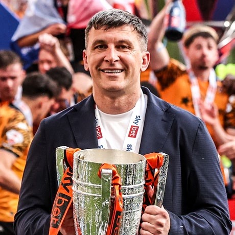 Sergej Jakirovi has his picture taken with the play-off trophy. (Photo by Alfie Cosgrove/News Images/NurPhoto via Getty Images)