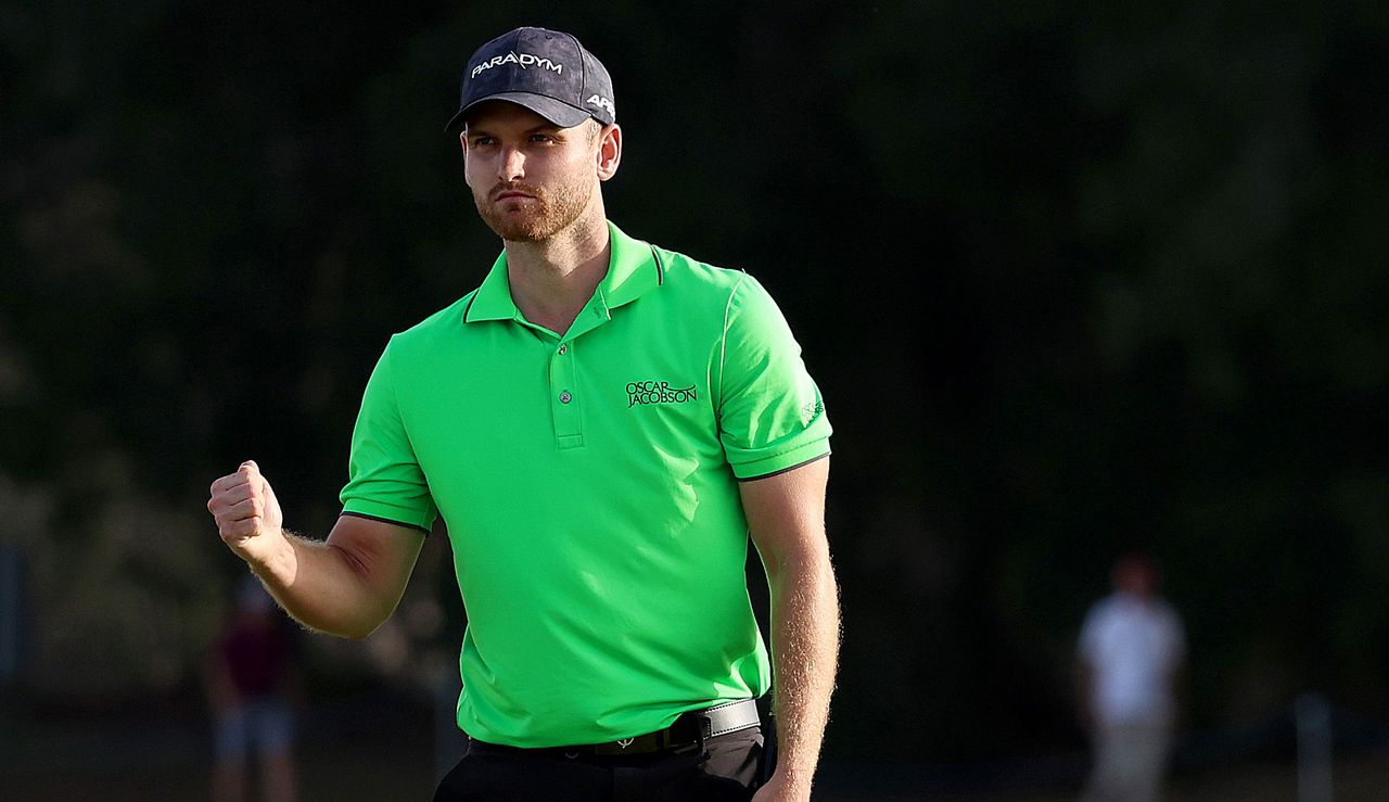 Gavins fist pumps after holing the winning putt at the 72nd hole