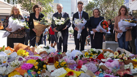 Australia Premier Anthony Albanese and New South Wales Premier Chris Minns lay flowers outside Bondi Junction shopping centre