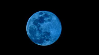 a blue-colored full moon