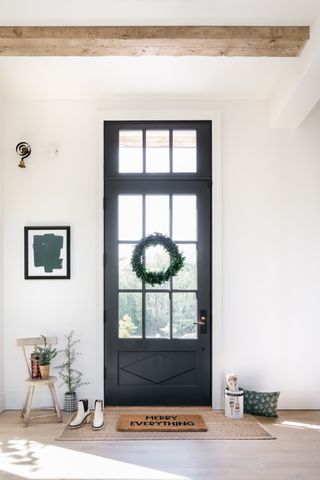 Christmas window decor wreath on door by Kate Marker Interiors