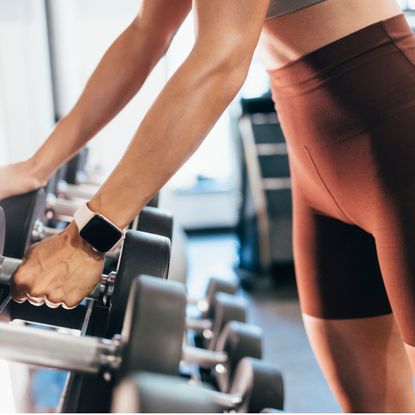 Resistance training: A woman lifting a heavy weight