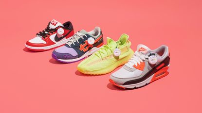 Four sneakers on pink background