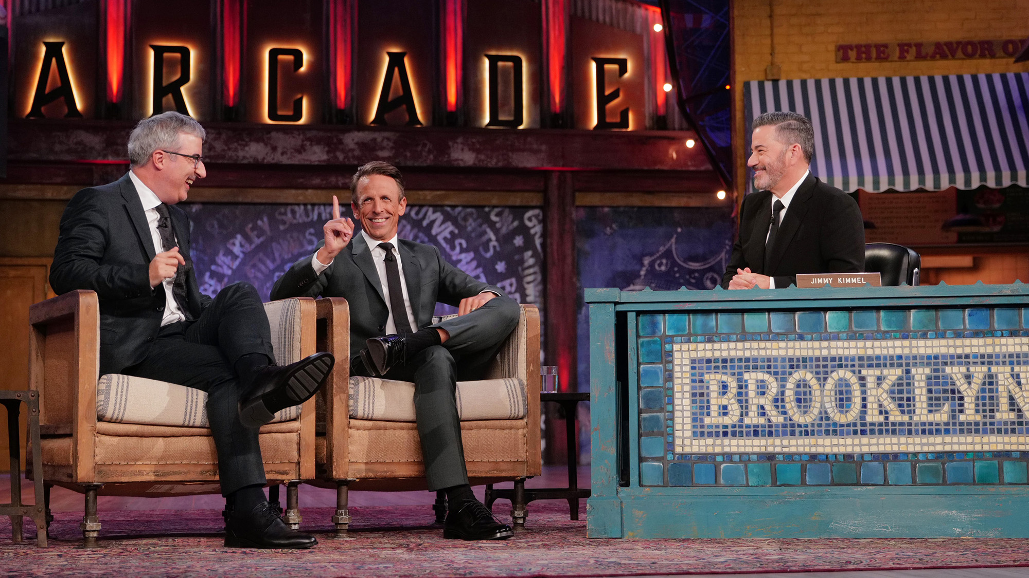 Jimmy Kimmel smiles at John Oliver and Seth Meyers as they roast him while on Jimmy Kimmel Live! from Brooklyn. 