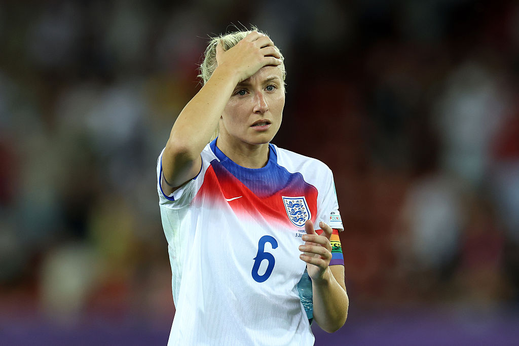 Leah Williamson with her hand on her head