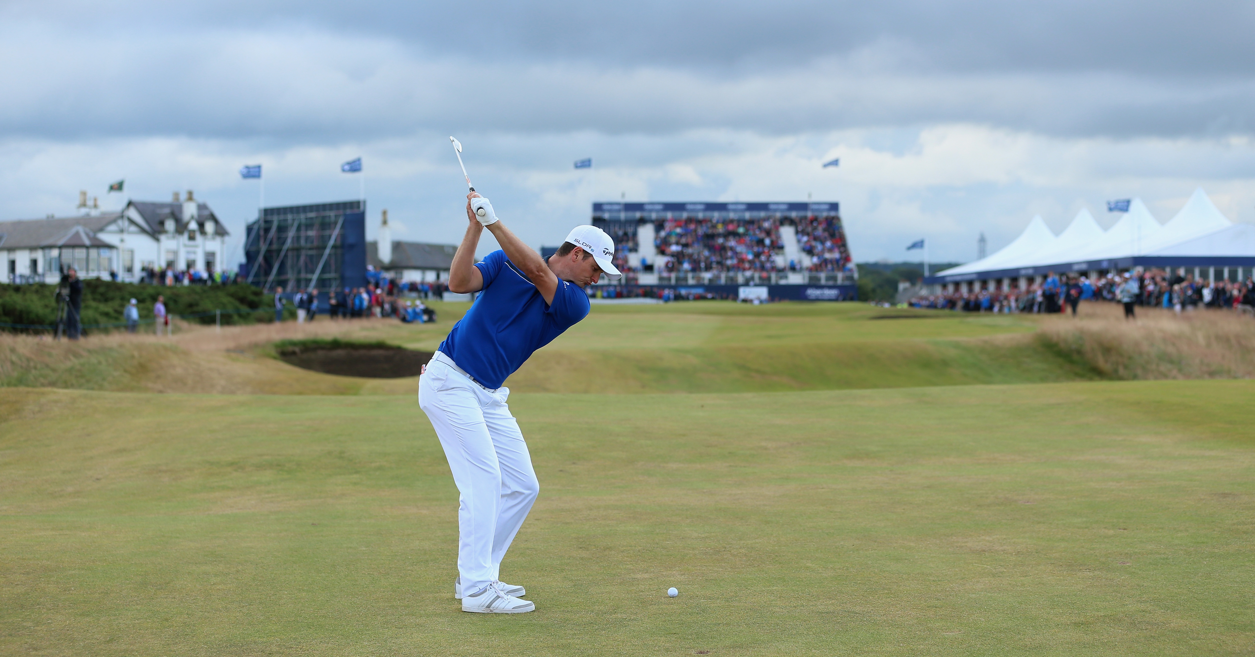 Justin Rose at the top of his backswing on an iron shot at the 2014 Scottish Open at Royal Aberdeen