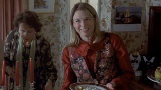 Bridget smiling with a plate in Bridget Jones's Diary