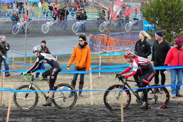 Devon Haskell (Team Tibco) leading Amanda Carey through the muddy track