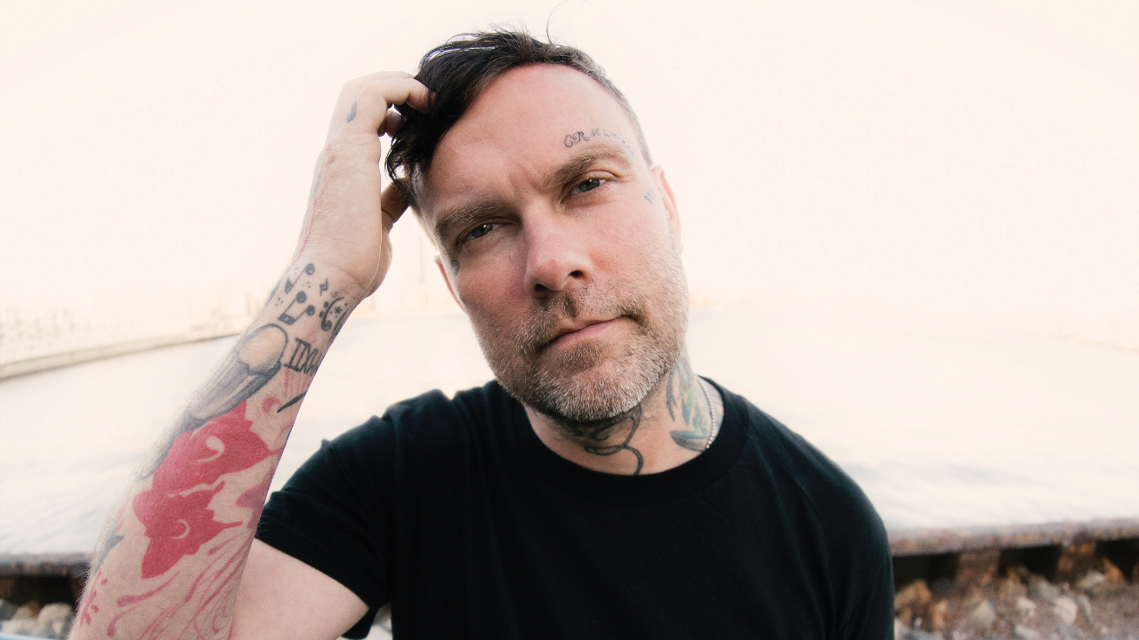 Bert McCracken scratching his head