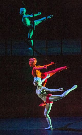 tree of code performance with a woman dressed in white and red