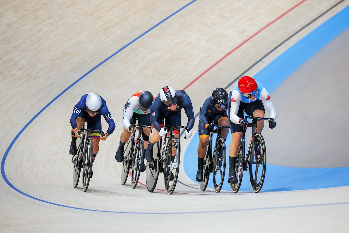 Picture by Ed Sykes/SWpix.com - 07/08/2024 - Paris 2024 Olympic Games - Track Cycling - National Velodrome, Saint-Quentin-en-Yvelines, France - Women&acirc;s Keirin Repechages - Kelsey Mitchell (Canada), Katy Marchant (Great Britain), Martha Bayona Pineda (Colombia)