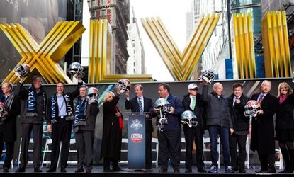 The NFL Super Bowl Host Committee holds a ceremony in Times Square before this Sunday's Super Bowl XLVIII game.