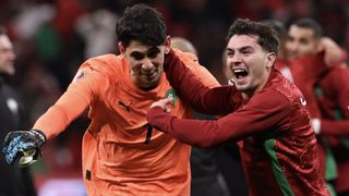 Morocco's Yassine Bounou and Brahim Diaz celebrate reaching the 2025/26 AFCON final
