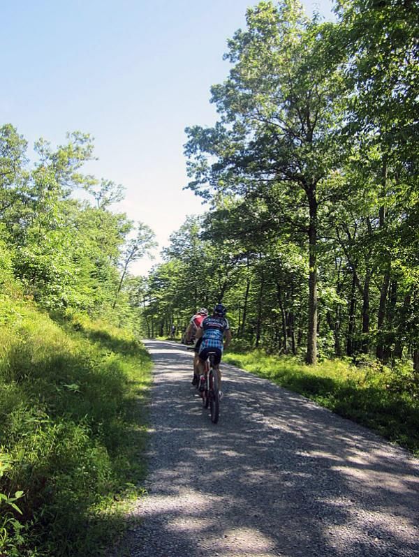 Jeff Schalk (Trek) leads Chrstian Tanguy (Team CF) up the longest steepest climb in the event on Seeger Rd. to aid station #3.