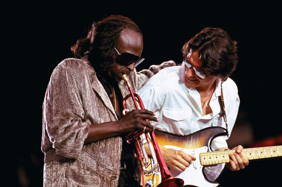 Miles Davis and Robben Ford onstage