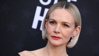 Carey Mulligan is pictured with a platinum blonde bob as she attends the 29th Annual Critics Choice Awards at Barker Hangar on January 14, 2024 in Santa Monica, California.