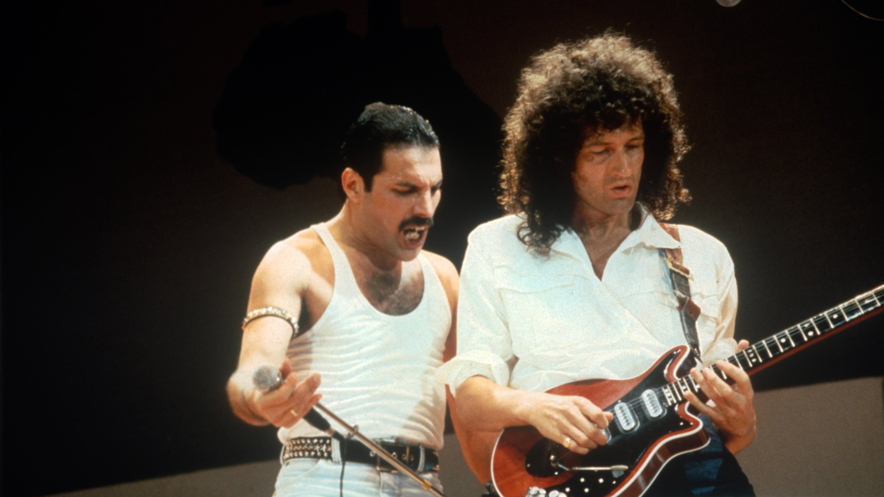 Freddie Mercury and Brian May of the band Queen at Live Aid on July 13, 1985 in London, United Kingdom.