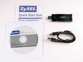 Figure 21 - The contents of the box of the ZyXEL AC240 Wi-Fi adapter. Note the USB extension cable.