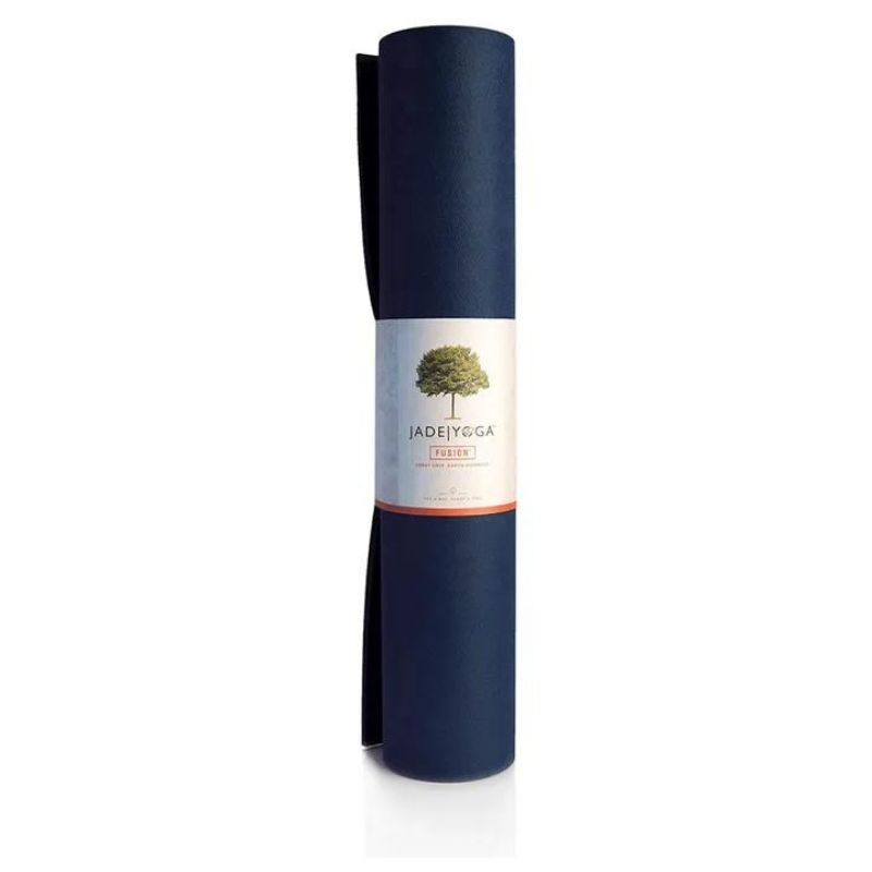 A rolled-up navy blue thick yoga mat.