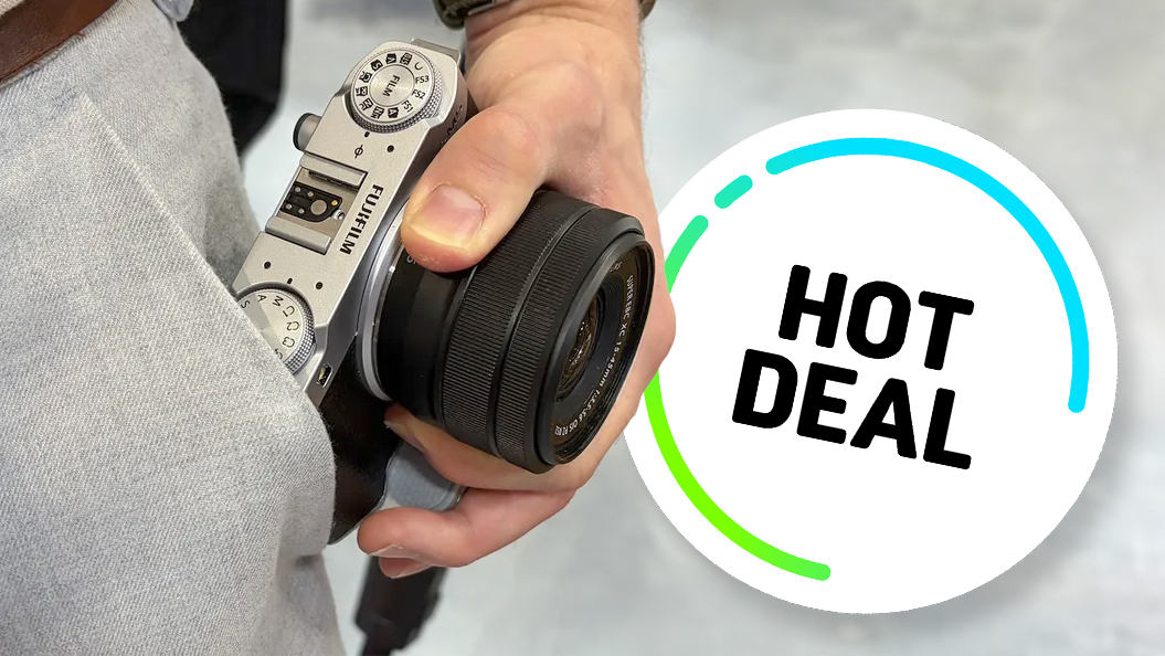 Fujifilm X-M5 being held in man's hand with Hot Deal flash