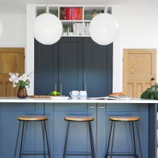 Kitchen island and breakfast bar with bar stools