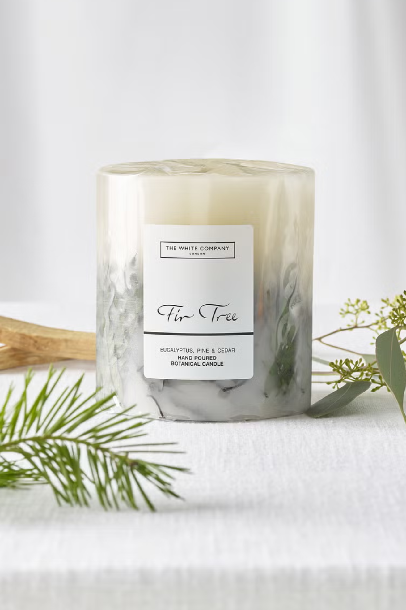 A white inclusion candle