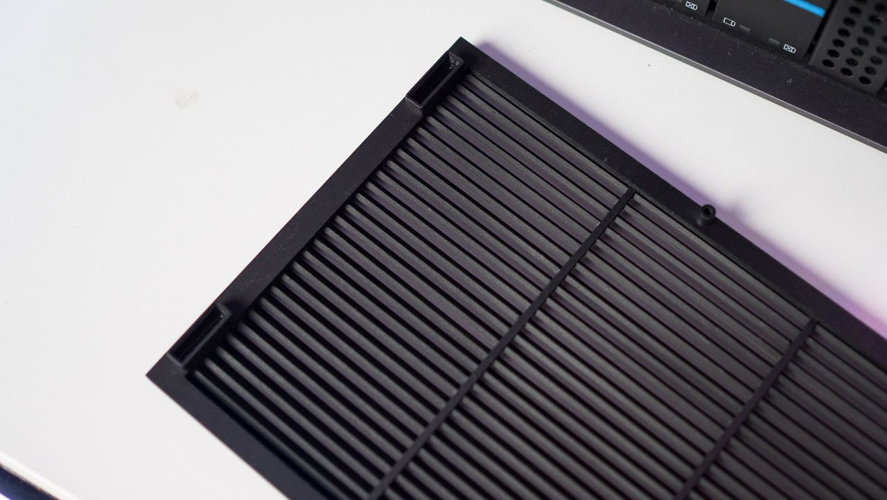 HDD grille of ZimaCube NAS against white table