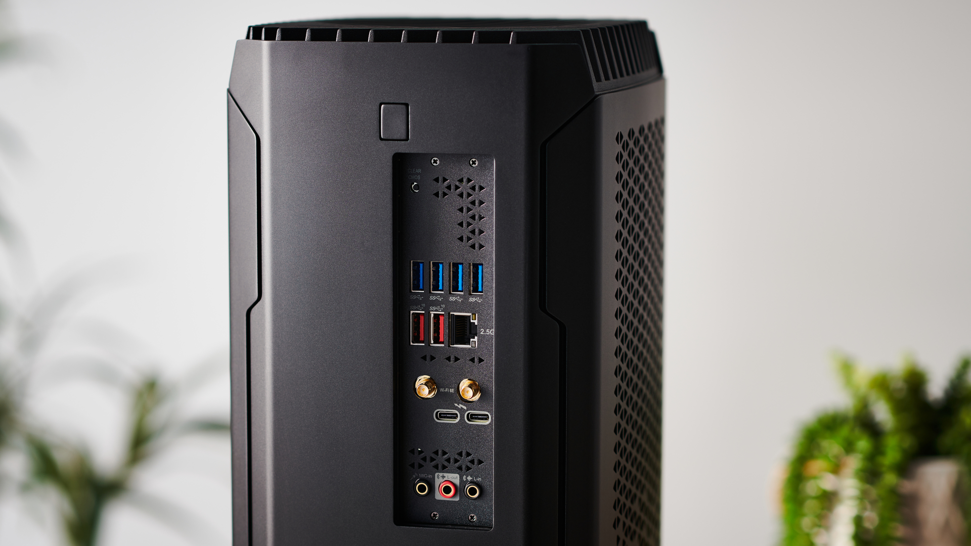 Corsair One i300 gaming PC on wooden desk