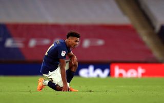 Brentford’s prolific striker Ollie Watkins was left dejected after failing to fire his side to the Premier League
