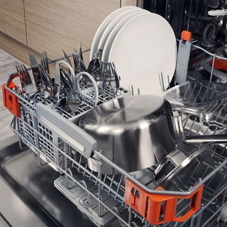 dishwashers inside plates and spoons