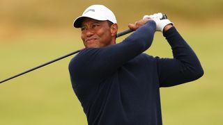 Tiger Woods takes a shot at The Open