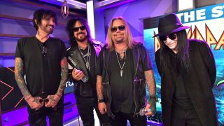 Motley Crue at a press conference in 2019