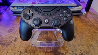 A close-up of the GameSir Tarantula Pro on its charging stand