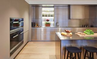 The sleek kitchen was designed by FLINT, the team behind the interior design of all of the Nova Building apartments