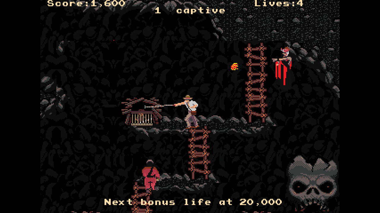 Indy uses his whip to free a child in the arcade Indiana Jones and the Temple of Doom - from Retro Gamer Magazine