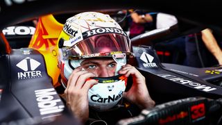  Max Verstappen of Netherlands and Red Bull Racing pulls on his helmet ahead of the 2023 Qatar Grand Prix live stream.