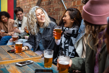 friends drinking at a pub - are pubs closing again?